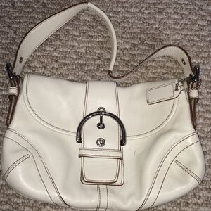 - White leather coach purse